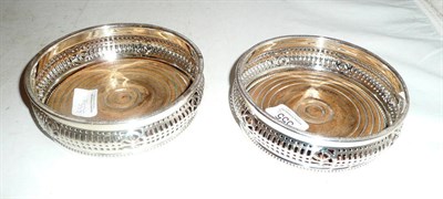 Lot 555 - Pair of plated coasters