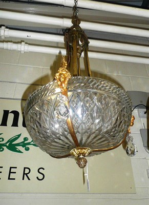 Lot 576 - A brass and ormolu mounted cut glass bowl light fitting