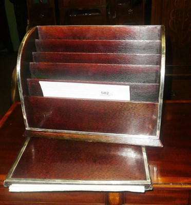 Lot 582 - Leather and silver mounted desk blotter and letter rack