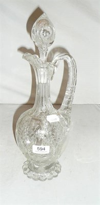 Lot 594 - A Webb "Rock Crystal" claret jug and stopper with greyhound crest, signed Webb, cracked neck