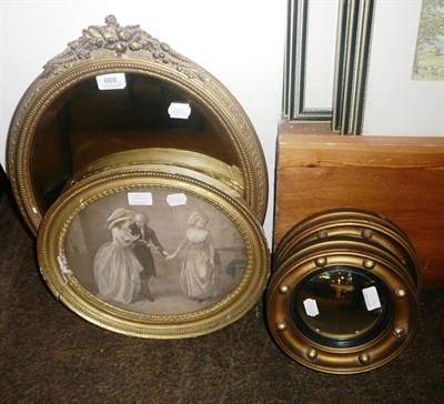 Lot 668 - Two convex mirrors, an oval mirror and a gilt-framed print