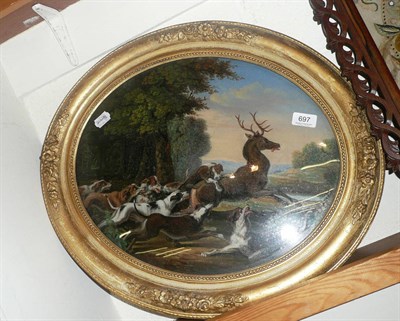 Lot 697 - A reverse painted hunting scene