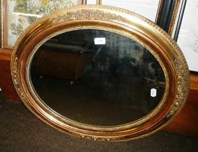 Lot 709 - Gesso oval gilt mirror