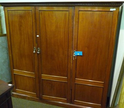 Lot 752 - Edwardian mahogany triple door wardrobe