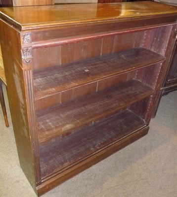 Lot 765 - A set of three mahogany dwarf bookcases with fluted uprights