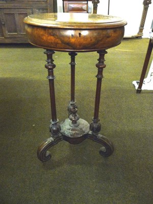 Lot 800 - A Victorian burr walnut work table (a.f. - one caster missing)