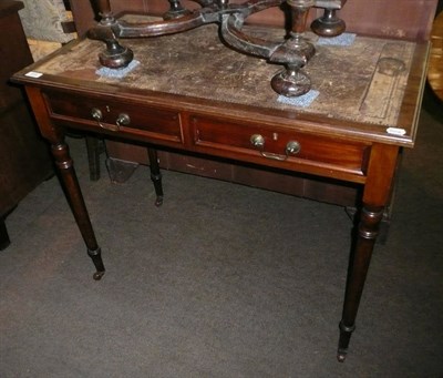 Lot 816 - Two drawer mahogany leather topped table