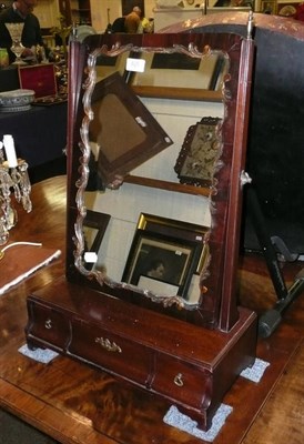 Lot 825 - Mahogany swivel mirror with three drawers