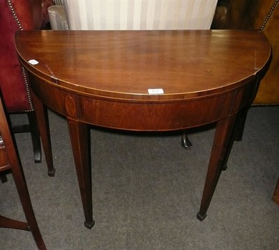 Lot 837 - Late 18th century mahogany demi-lune table