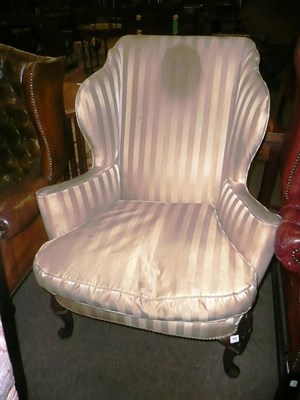 Lot 842 - George III style wing armchair