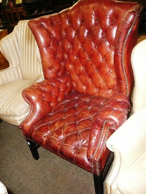 Lot 843 - Early 20th century leather button back armchair