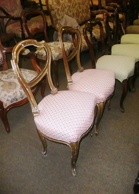 Lot 852 - Three Victorian mahogany salon chairs and a pair of gilt painted balloon-back chairs