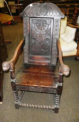 Lot 874 - Oak Wainscot chair with figurehead arms