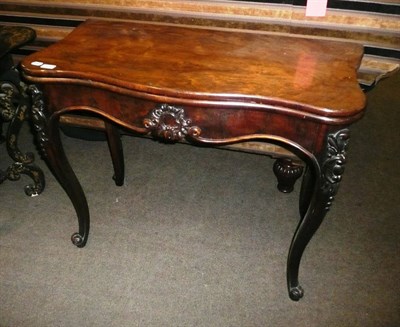 Lot 879 - A Victorian rosewood fold over butterfly-top side table on French cabriole legs