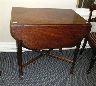 Lot 894 - A mahogany Pembroke table raised on square chamfered legs and joined by an under stretcher