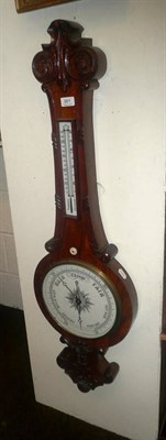 Lot 901 - A walnut wheel barometer