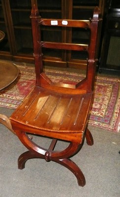 Lot 912 - Pair of pitch pine 'x'-frame hall chairs