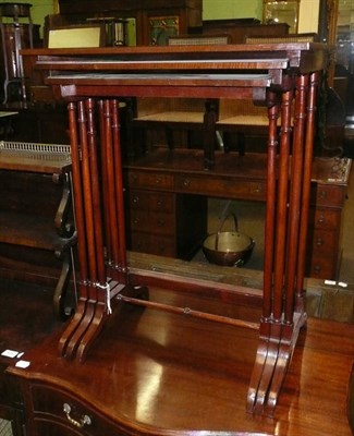 Lot 918 - Inlaid mahogany nest of three tables