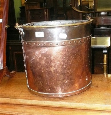 Lot 921 - A cavalry brass and copper bucket with liner and a miner's safety lamp