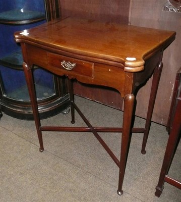 Lot 941 - Mahogany serpentine-fronted fold-over card table, stamped 'Gillows'