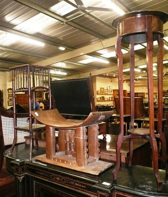 Lot 943 - Tribal stool, mahogany plant stand and a bamboo plant stand