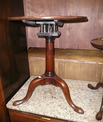 Lot 946 - Mahogany birdcage action tripod table