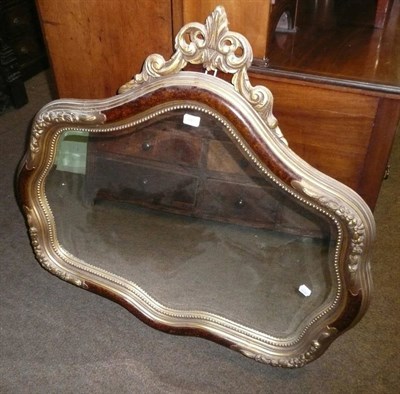 Lot 948 - Reproduction gilt framed cartouche shaped mirror