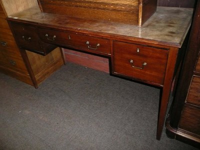 Lot 951 - Three drawer mahogany dressing table