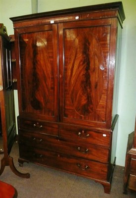 Lot 964 - A 19th century mahogany linen press