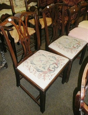 Lot 988 - Pair of George III mahogany dining chairs with needle drop-in seats