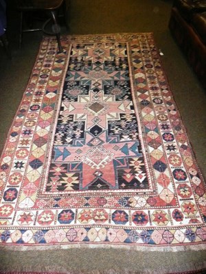 Lot 994 - Lesghi rug, East Caucasus, the indigo field with a column of stellar motifs