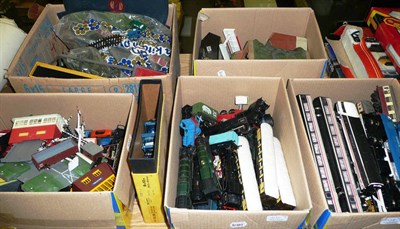 Lot 1034 - A Collection of Playworn 'OO' Gauge Trains and Accessories, including locomotives, wagons, coaches