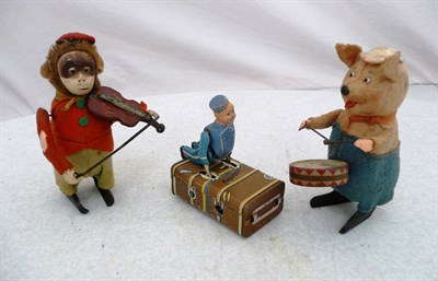 Lot 1047 - Three Clockwork Tinplate Toys:- Schuco Monkey Violinist, with red felt jacket and fez; Schuco...