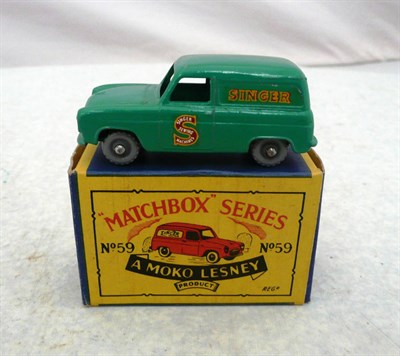 Lot 1116 - A Boxed Matchbox 1-75 Series Ford Thames 'Singer' Van No.59, with dark green body and grey...