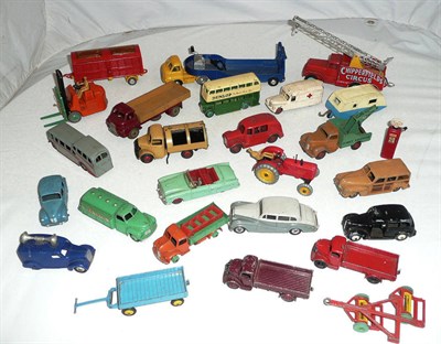 Lot 1150 - Twenty Two Playworn Dinky Vehicles, including cars, commercials, tractor and trailers,...