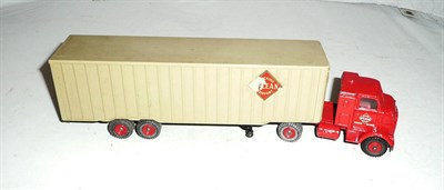 Lot 1151 - A Boxed Dinky Supertoys McLean Tractor-Trailer No.948, with red cab, grey plastic trailer, red...