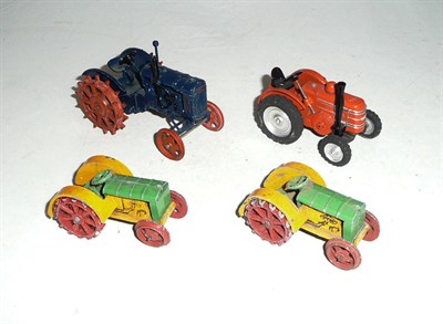 Lot 1156 - Two Dinky Pre War No.22e Farm Tractors, both in green and yellow, with red wheels, 'Dinky Toys'...