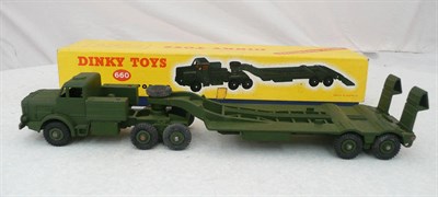 Lot 1160 - A Boxed Dinky Supertoys Tank Transporter No.660, in matt green, no window glazing, driver,...