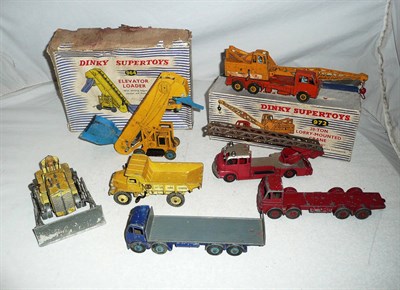 Lot 1161 - Seven Boxed Playworn Dinky Supertoys - Blaw Knox Bulldozer No.961, Elevator Loader No.964,...