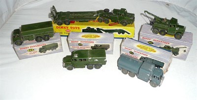 Lot 1164 - Five Boxed Playworn Dinky Supertoys Military Vehicles - Tank Transporter No.660, 10-ton Army...