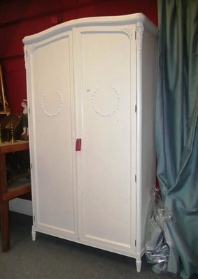 Lot 1519 - A French white painted wardrobe with birds-eye maple interior