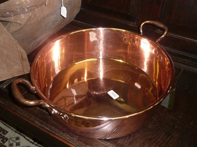 Lot 1642 - A large copper cream pan