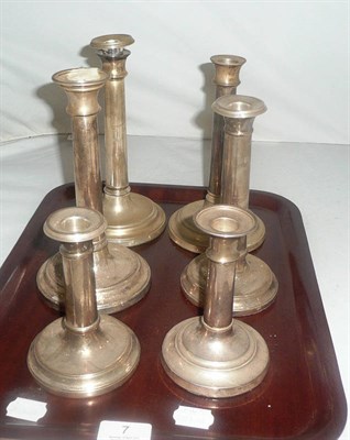 Lot 7 - A pair of silver candlesticks and four other silver candlesticks