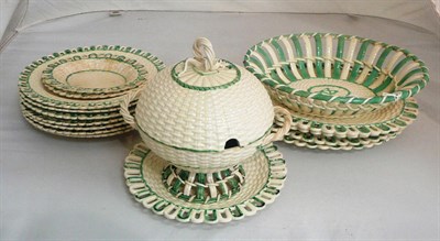 Lot 9 - A Leeds creamware and green decorated part service- sauce tureen and cover on stand, chestnut...