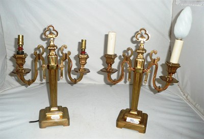Lot 50 - A pair of twin branch candelabra