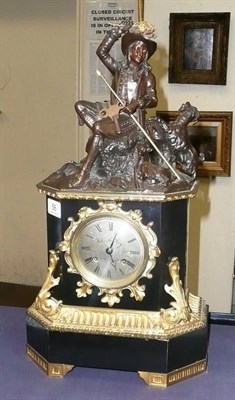 Lot 56 - A figural black slate striking mantel clock