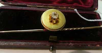 Lot 87 - A diamond set stick pin (diamond chipped)