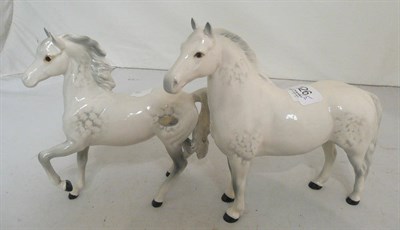 Lot 126 - A Beswick Thoroughbred Stallion, grey, also a Beswick Palomino (Prancing Arab Type), grey (2)