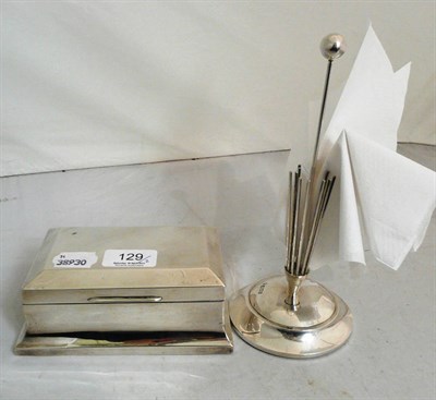 Lot 129 - Silver napkin ring stand and a silver-mounted hinged cigarette box