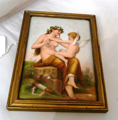 Lot 139 - A 19th century small porcelain plaque depicting a nude girl with Cupid